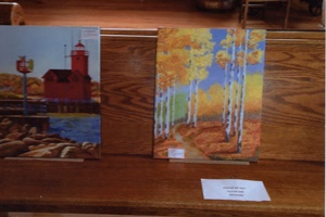 lighthouse and birch trees in acrylic
